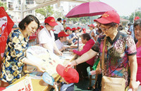 河南：社区志愿服务队“走出”管理新模式
