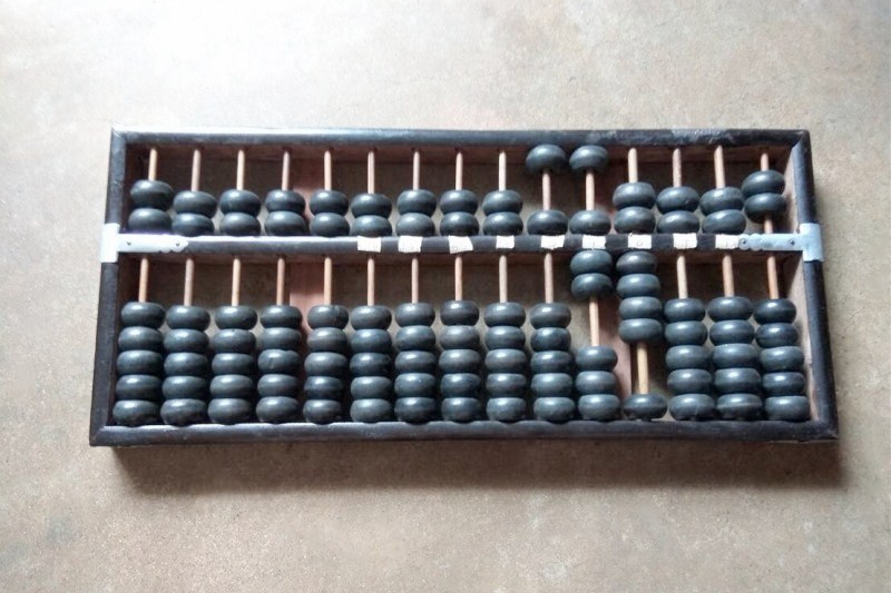 一把算盘：40年前拨响技艺 40年后成为记忆